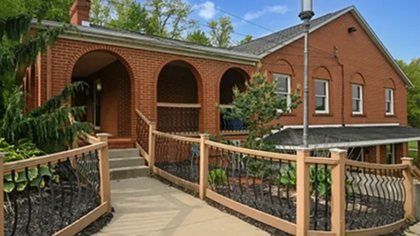 The clinic exterior and front walkway at Pamer Chiropractic Life Center West