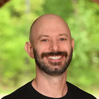 A headshot photo of Dr. Matt Pamer, the chiropractor at Pamer Chiropractic Life Center West
